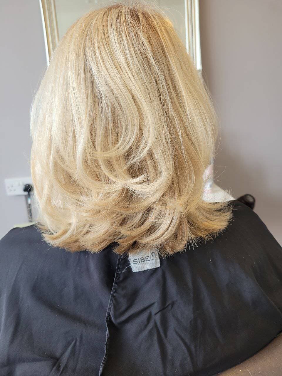 blonde wavy hair styled