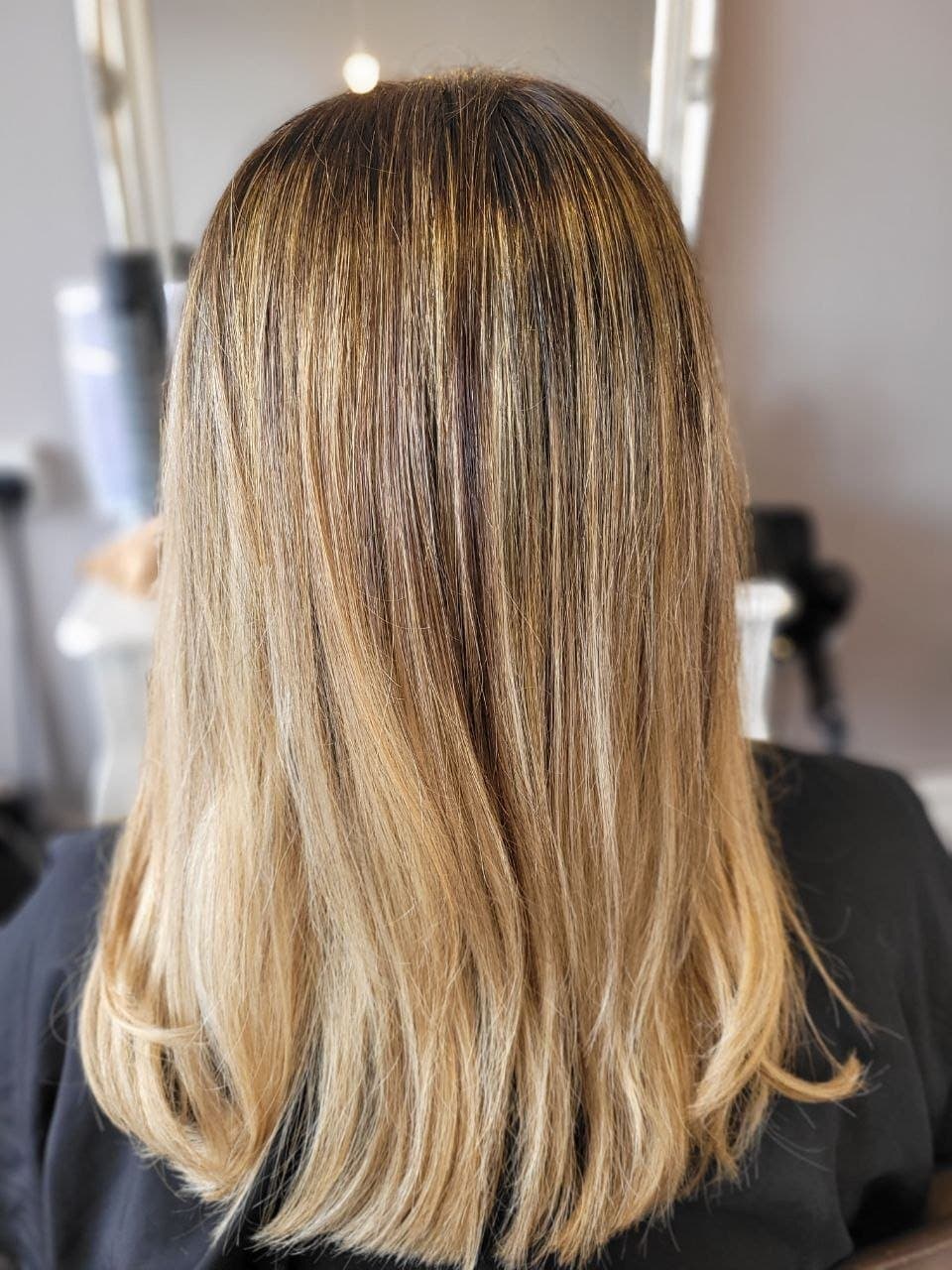 mid-length highlighted hair back view