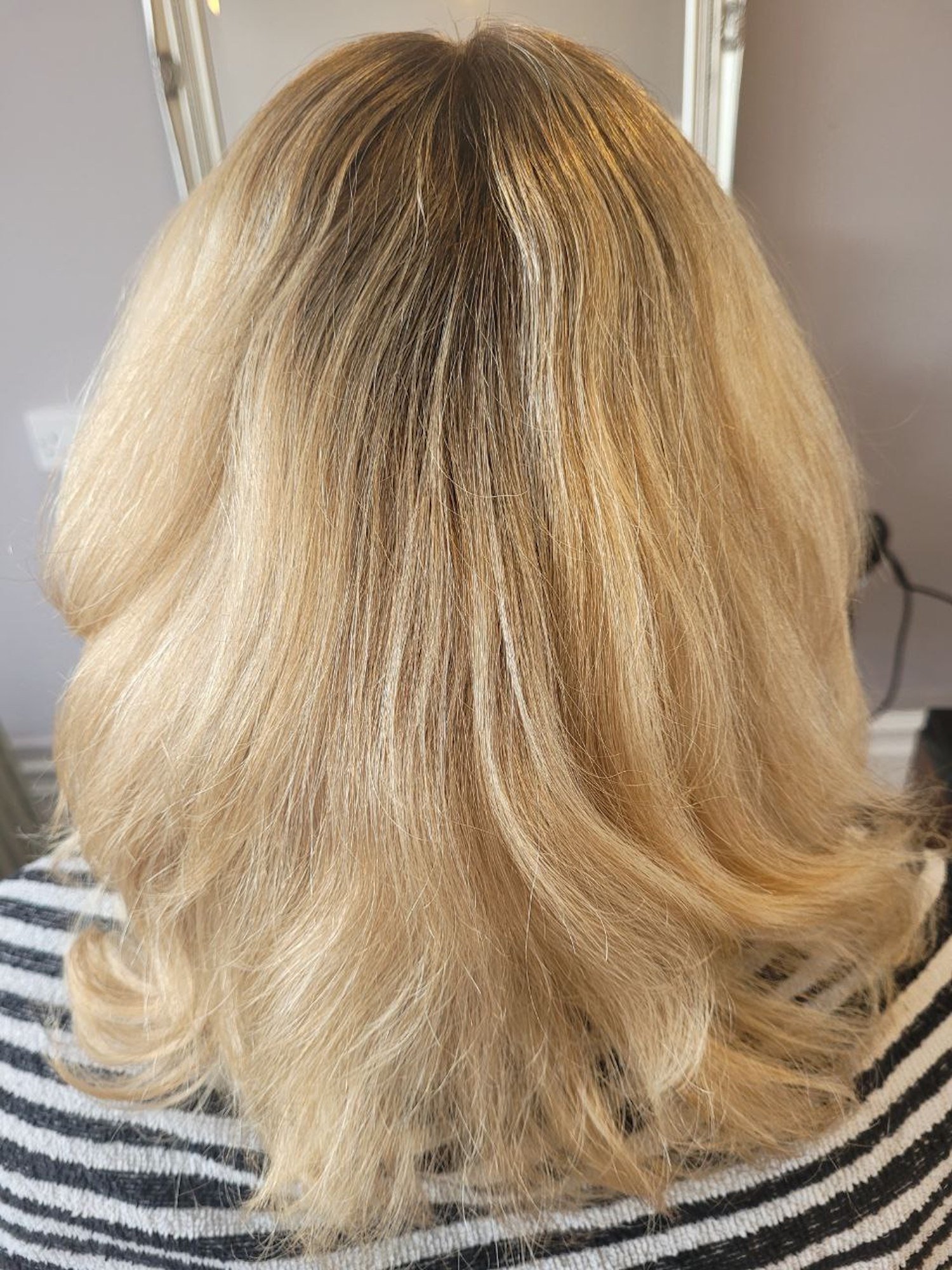 mid blonde hair in need of styling