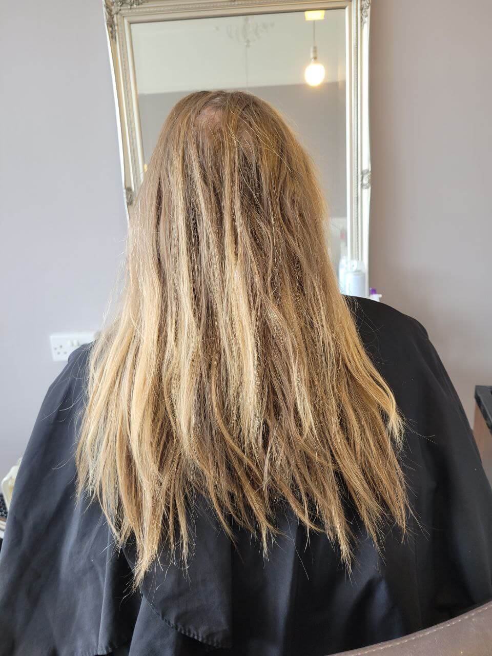 long frizzy blonde hair