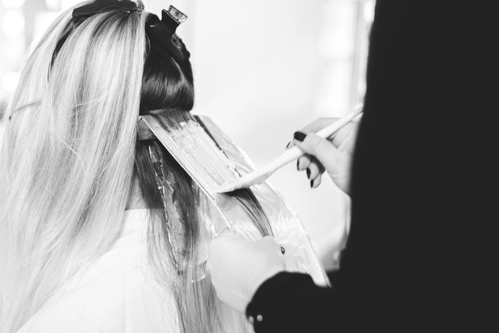 hair being coloured with foils